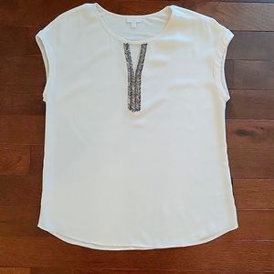 Cream blouse with bead accents